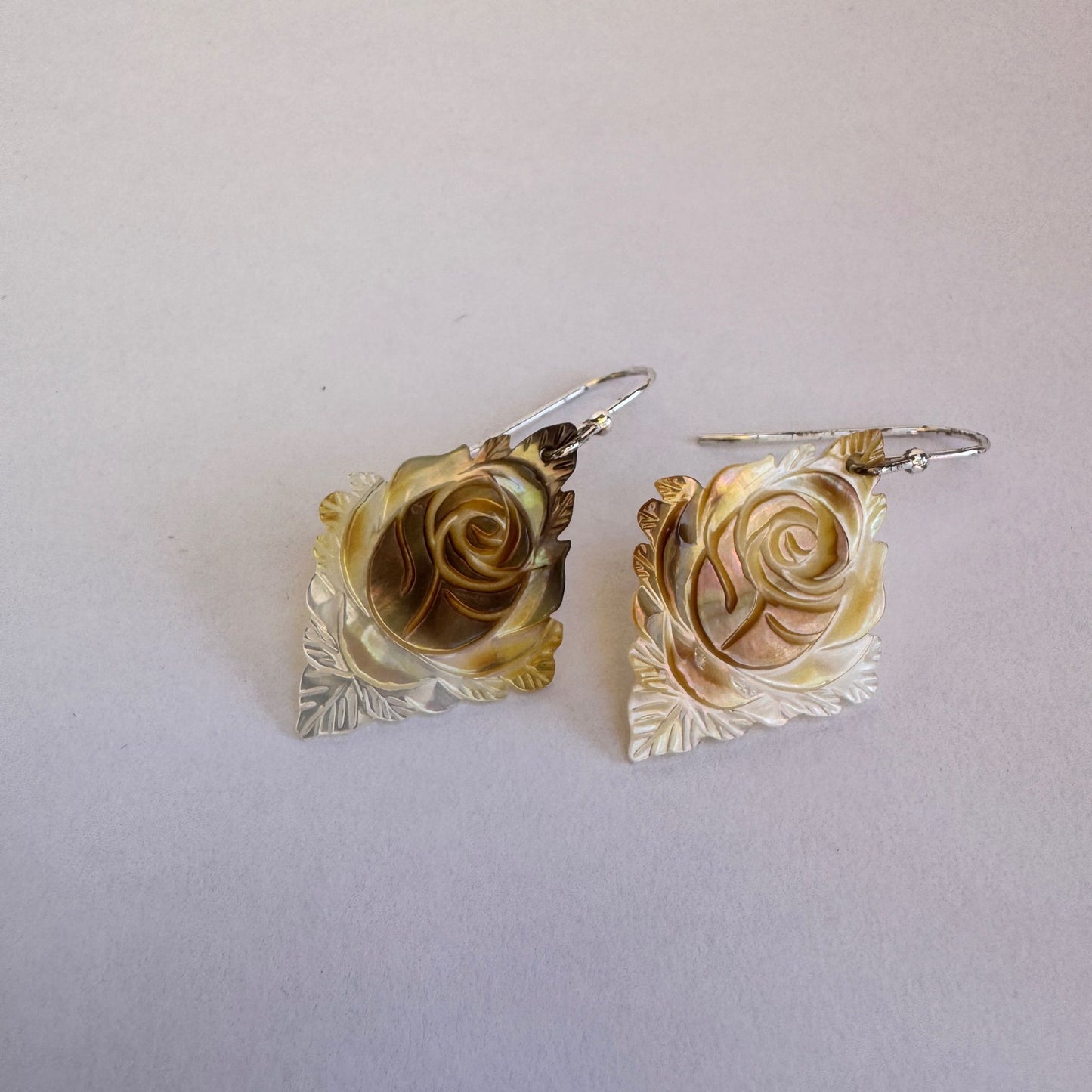 Carved golden mother or pearl sterling silver earrings