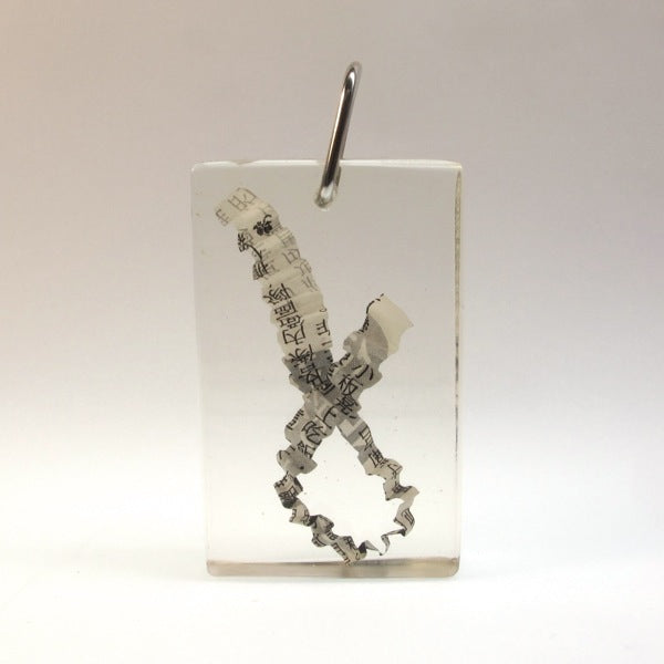 Resin pendant with imbedded crimped paper