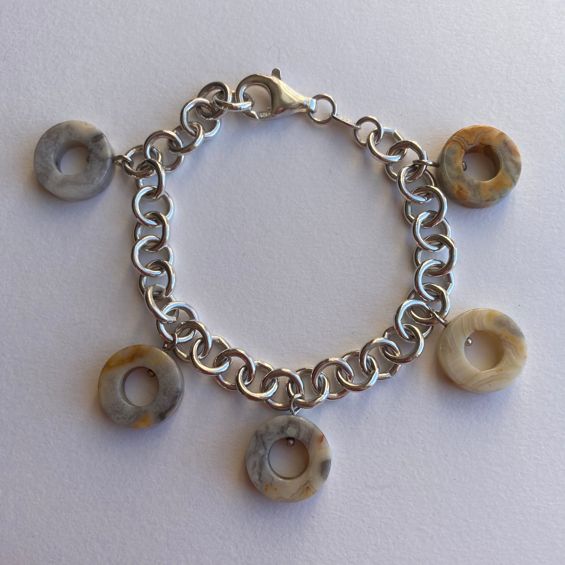 Sterling silver chain bracelet with 5 hanging banded agate washer shapes  